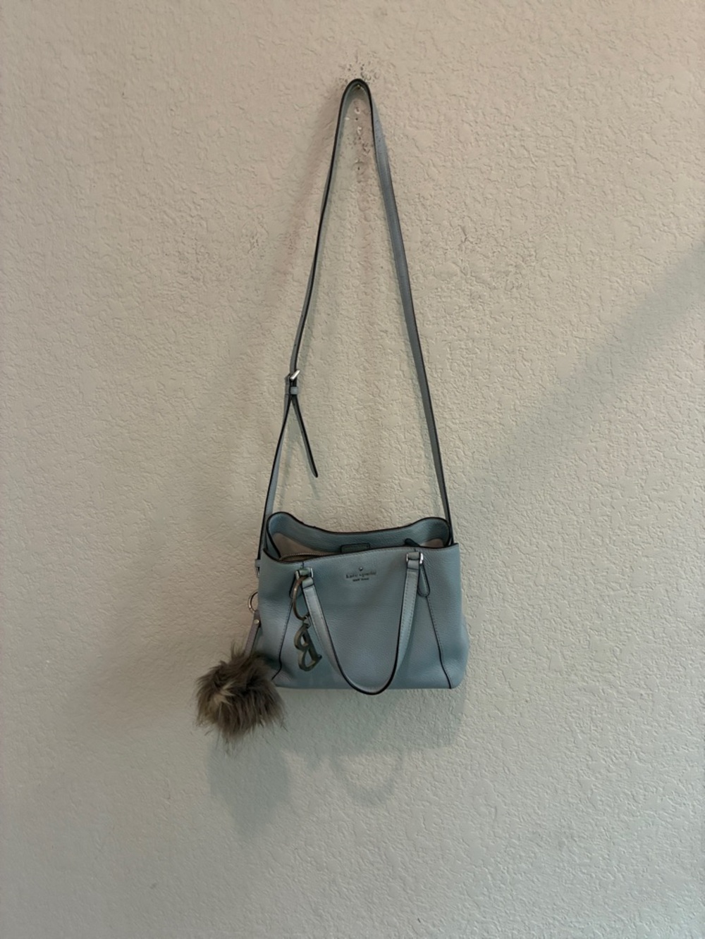 kate spade light blue pebbled leather crossbody shoulder bag with fur charm